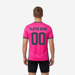 Close-up of V-neck collar and charcoal trim detail on custom pink soccer training jersey