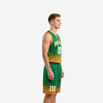 Front view of custom kelly green basketball uniforms showing V-neck jersey with gold armhole binding arced team name in white and front number 00 on green body