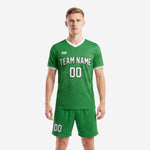 Front view of custom Kelly Green soccer uniform kit with white topographic sublimation print and matching shorts