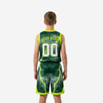 Opposite side view of youth green and neon lime lightning basketball uniform set showing side panel continuity between jersey and shorts