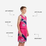 Right side view of custom kids basketball uniform in hot pink with navy diagonal stripe panels and white V-neck binding detail