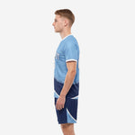 Custom light blue and navy blue soccer uniform right side view showing sublimated arc detail on shorts hem