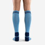 Close-up of navy double-stripe ribbed cuff on custom light blue soccer socks