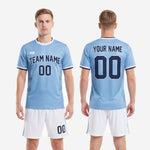 Back view of custom light blue soccer uniform design showing player name and number placement