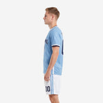 Right side view of custom soccer uniform design in light blue jersey and white shorts