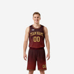 Custom maroon and gold basketball uniforms with gold pinstripes, arced team name on chest, matching shorts with gold hem band, front view