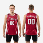 Back view of custom maroon basketball jersey showing player name and number placement on crimson sublimated fabric with white side-panel trim