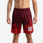 Custom maroon basketball shorts with red-orange flame sublimation print, player number on front, shown front and back on male model