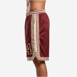 Opposite side view of custom maroon basketball shorts with cream side stripe and elastic striped waistband visible