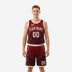 Custom maroon and gold basketball uniforms with lightning bolt sublimation pattern, arced team name and number on the front, matching shorts