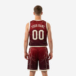 Opposite side view of the maroon and gold basketball uniform set showing matching shorts waistband and hem binding detail