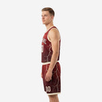 Side view of custom maroon sublimated basketball jersey and shorts set showing lightning pattern extending across the full body