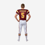 Back view of custom maroon and gold youth tackle football uniform showing sublimated design, back nameplate area, and matching white pants with double side stripe