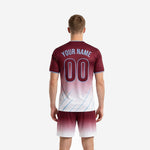 Custom maroon and white gradient soccer kit front detail showing team name chest print and front number zone in sky blue