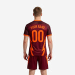 Custom orange soccer uniform jersey detail showing V-neckline with orange trim band and sublimated chest print zone