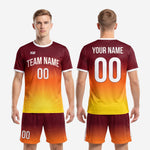 Custom maroon to orange gradient soccer uniform shorts detail showing white outer seam stripe and elastic drawcord waistband