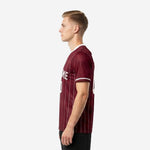 Custom maroon pinstripe personalized soccer jersey right side view showing back name and number placement on male model