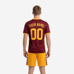 Custom maroon and Athletic Gold soccer jersey front detail with sublimated team name arched across chest and player number below