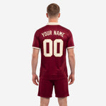 Detail front view of custom maroon soccer jersey with arched team name and number sublimation