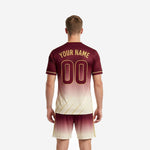 Front detail of custom maroon and cream sublimated soccer kit showing team name, number, and geometric leaf watermark pattern