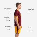 Custom maroon soccer kit showing sublimated player number on Athletic Gold shorts leg and V-neck collar contrast trim detail