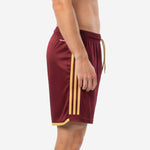 Custom maroon soccer shorts showing 3 Vegas Gold side stripes running full outer seam length, left side view