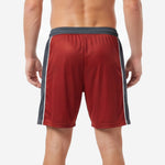 Custom maroon soccer shorts lower hem detail showing straight hem finish and charcoal to maroon panel transition