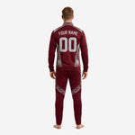 Custom maroon soccer tracksuit back view with player name and number printed via full-dye sublimation on 100 percent polyester fabric