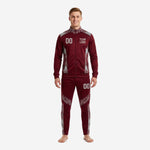 Custom maroon soccer tracksuit front view showing team logo, number 00, and silver hex panel design on jacket and tapered pants