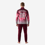 Custom maroon soccer tracksuit jacket detail showing rose pink and Silver Grey gradient fade with star constellation print and full-zip closure