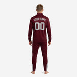 Custom maroon soccer tracksuit jacket chest detail showing player number 00 and team logo print zone in silver-grey