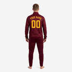 Custom maroon soccer tracksuit jacket detail showing full-dye sublimation geometric texture and Athletic Gold chest number print