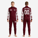 Tapered maroon soccer tracksuit pants showing white sublimated outer leg panel detail