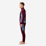 Custom maroon and sky blue soccer tracksuit side profile showing tapered pant leg and ribbed ankle cuff