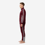 Custom maroon soccer tracksuit alternate side view showing tapered pant leg with silver-grey stripe and ankle zip detail