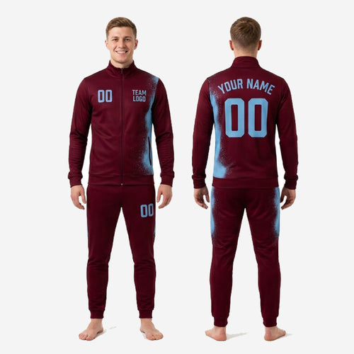 Close-up of sky blue splash particle burst print on custom maroon soccer tracksuit set