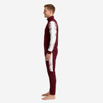 Custom maroon soccer tracksuit tapered pants with white side panel, side profile on male model
