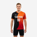Custom mens soccer practice jersey in jet black and orange with full-dye sublimation gradient colorblock, front view
