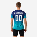 Chest detail of custom mens soccer practice jersey showing Teal gradient and sublimated team name and number zones
