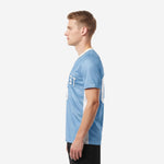 Right side view of custom men's soccer team jersey in powder blue with white contrast side panel and back number