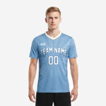 Custom men's soccer team jersey in powder blue with white radiating ray pattern and arched team name on chest