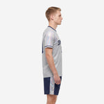 Men's soccer team uniforms Silver-Grey and Navy Blue side view showing iridescent shimmer on jersey body