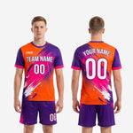 Full back view of custom men's soccer team uniform kit in orange royal purple and hot pink splash sublimation print