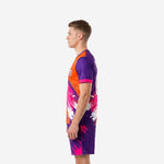 Custom sublimated men's soccer uniform side view, orange royal purple and hot pink splash design, short sleeve crew neck