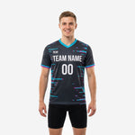 Custom mens soccer training jersey in charcoal with teal and fuchsia burst sublimation print, front view showing team name and number