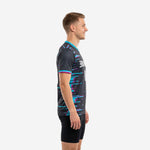 Custom mens soccer training jersey charcoal teal fuchsia side view showing full edge to edge sublimation pattern