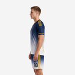Custom men's soccer uniforms navy blue to white gradient right side view showing V-neck jersey and shorts with gold trim detail