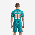 Teal camo custom soccer shorts with blaze orange side stripe, part of men's matchday uniform set