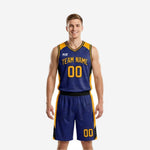 Custom navy and gold basketball uniforms front and back view showing sublimated side panels, V-neck collar, team name arc, and matching shorts