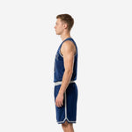 Left side view of custom navy basketball uniforms showing side panel stripe on shorts and V-neck jersey with silver binding detail